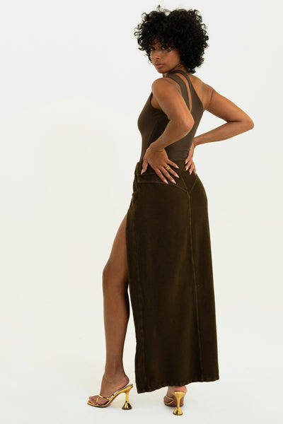 Back of Espresso Aspen Cargo Skirt with cargo pocket, high leg slit, crafted from soft corded terry fabric. 