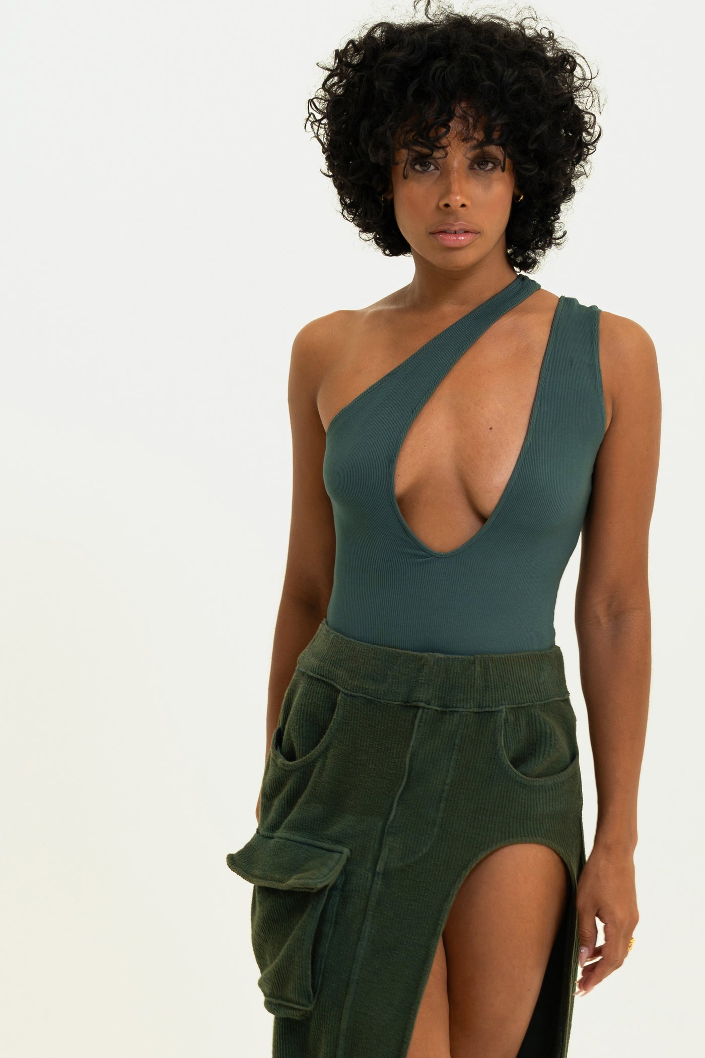 Olive Asymmetrical Bodysuit in soft modal rib, featuring a unique, modern cut for an elegant and comfortable fit