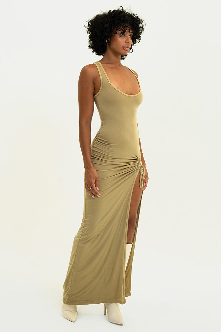 Model sporting the Sand Lola Dress - Featuring a comfortable fit, adjustable high slit.