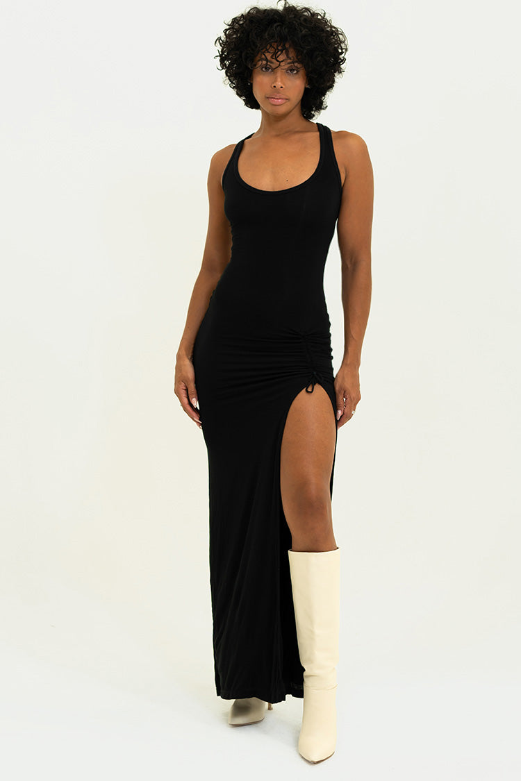 Model in Black Lola Dress - Showcasing the adjustable high slit and double-lined tank design.